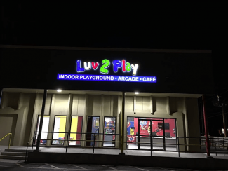 Luv 2 Play outdoor illuminated sign by Signergy